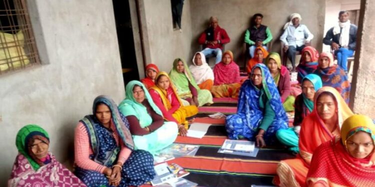 women self-help group which is earning livelihood by making ladoos from mahua in Naudhia village of Madhya pradesh. Captured by Pooja Yadav.