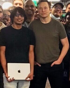 Akash Gaurav (left) with Elon Musk
