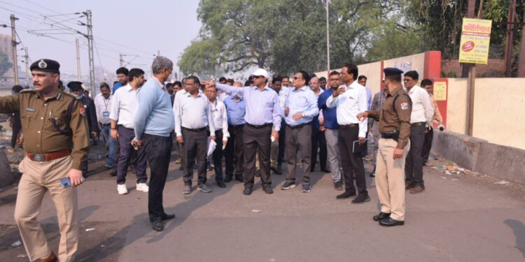 ECR general Manager (in cap)  inspects out of station