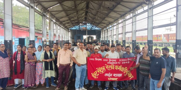 Railway employees demonstrate for Old Pension Scheme