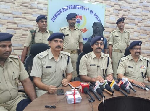 Rural SP, Rishab Garg (third from left) addressing the media as the arrested murderer is standing behind at the police office