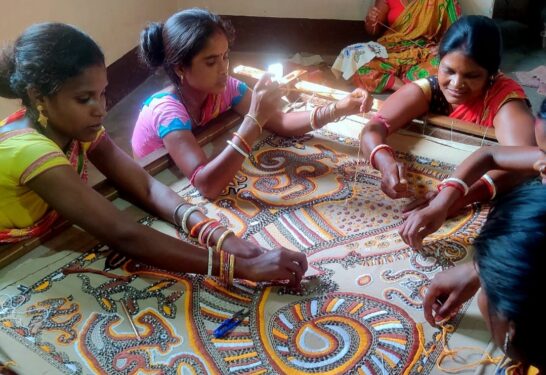 Women busy in learning the embroidery skill at Ahimsa Imprints' training center in Mohanpur, Gamharia