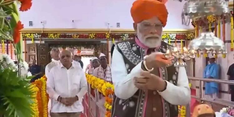 PM Modi Visits Gujarat, Offers Prayers to Tribal Deity Pandori Mata, Holds Grand Roadshow in Surat